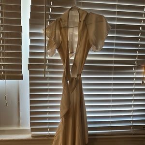 Cute backless vacation dress with slit at the bottom